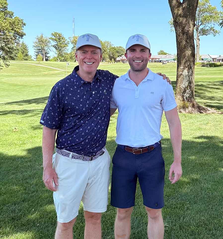 Tom and Andrew on the golf course